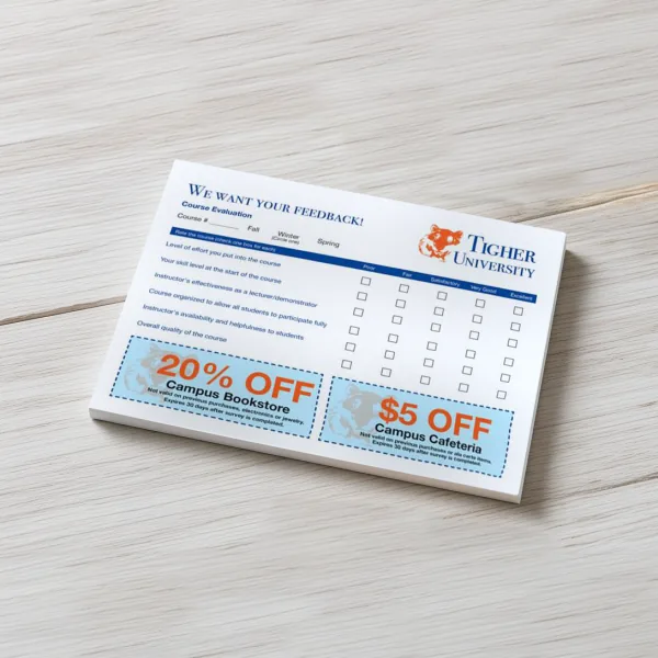 Custom printed sticky notepad with a Tigher University course evaluation form and two campus coupons on light wood.