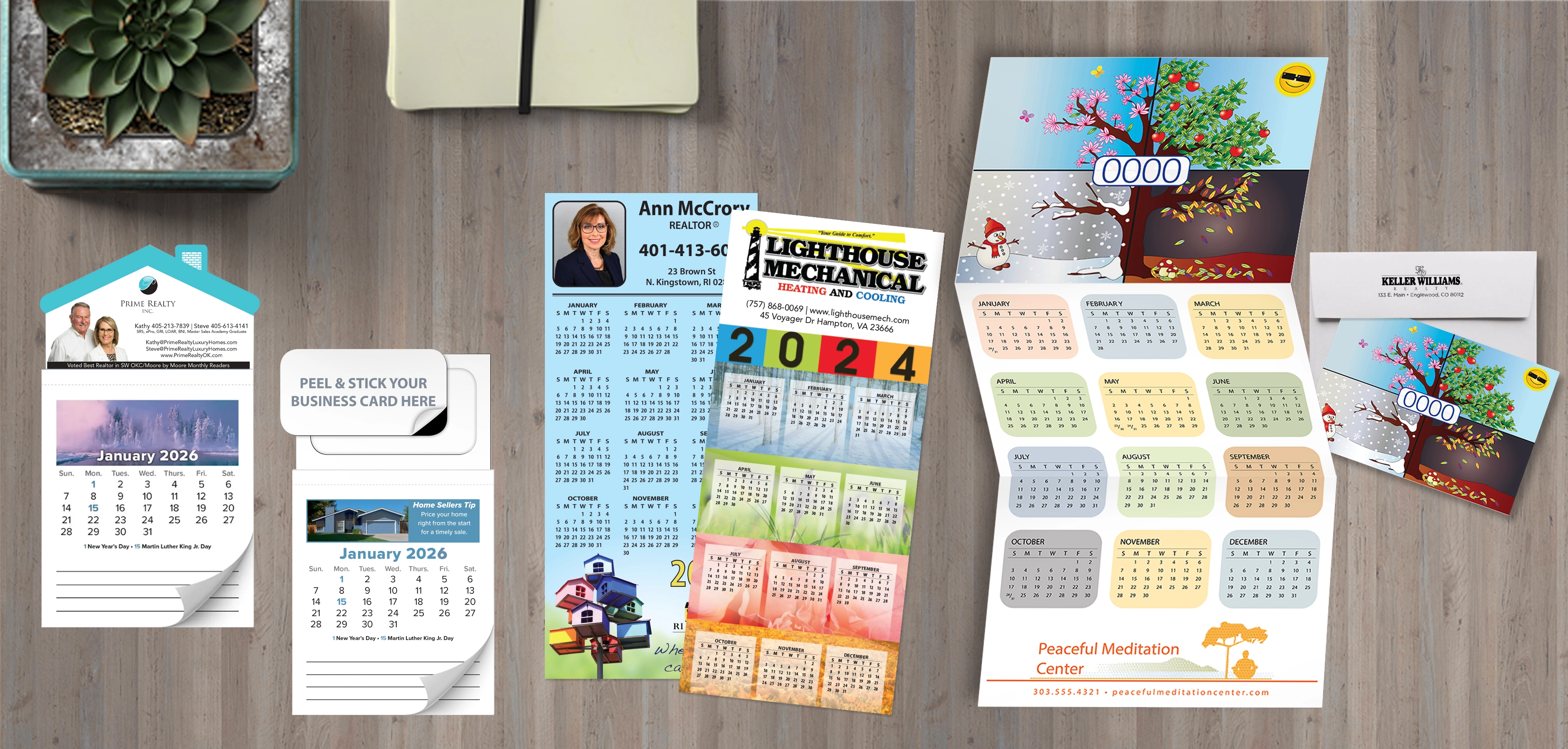 Assorted custom calendars including house-shaped, tri-fold, and large fold-out designs with realtor and business branding.