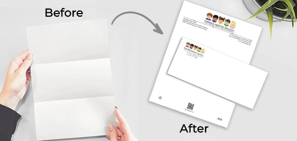 Hands unfolding a blank tri-fold self-mailer next to printed version with envelope and QR code design.