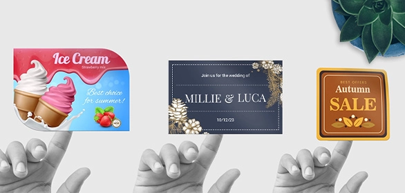 Three hands holding business cards with strawberry ice cream, floral wedding invitation, and autumn sale designs.