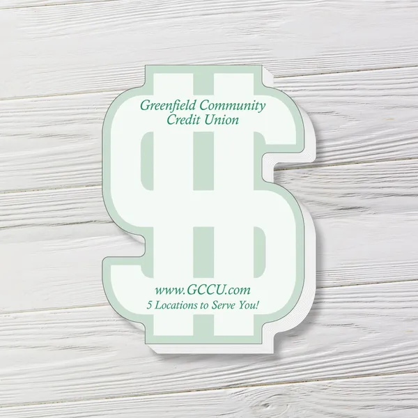 Green and white die-cut dollar sign custom notepad with 50 sheets on wooden background