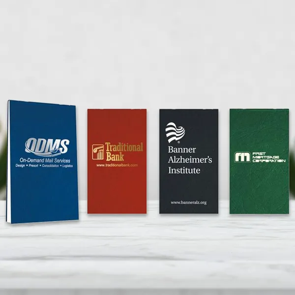 Flex Memo Books 2 13/16" x 5" custom notepads in blue, red, black, and green