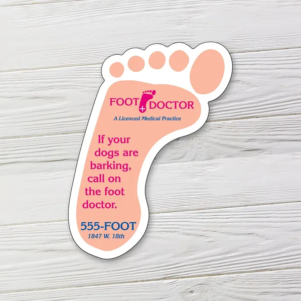 Peach footprint-shaped magnet promotional product, 2.625"x3.5", white border with pink text.