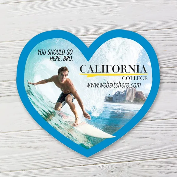 Small blue heart-shaped magnet with surfing photo and custom promotional design