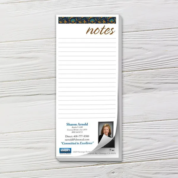 Custom notepad with blue and gold decorative header on white paper
