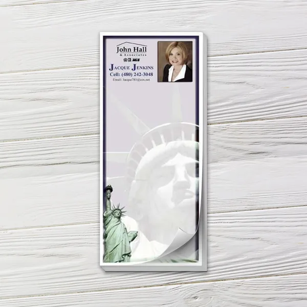 Custom Statue of Liberty notepad with professional photo design, white and navy layout.