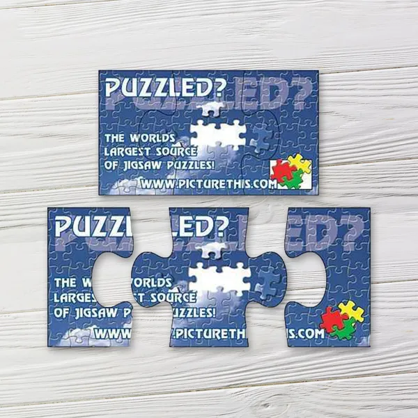 Three-piece puzzle shape magnet in blue with white text, 3.5"x2" promotional product