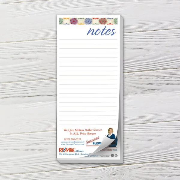Custom notepad with colorful floral header and lined pages on white background