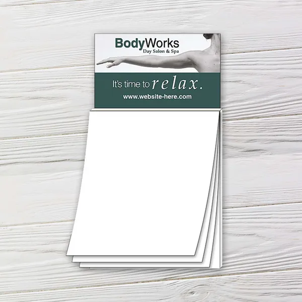 Magna-Pad Business Card Magnet notepad with green and white stock design on wooden surface
