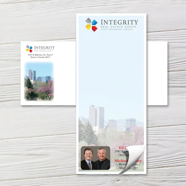 Custom notepad with Denver skyline design, light blue and white color scheme, matching envelopes included
