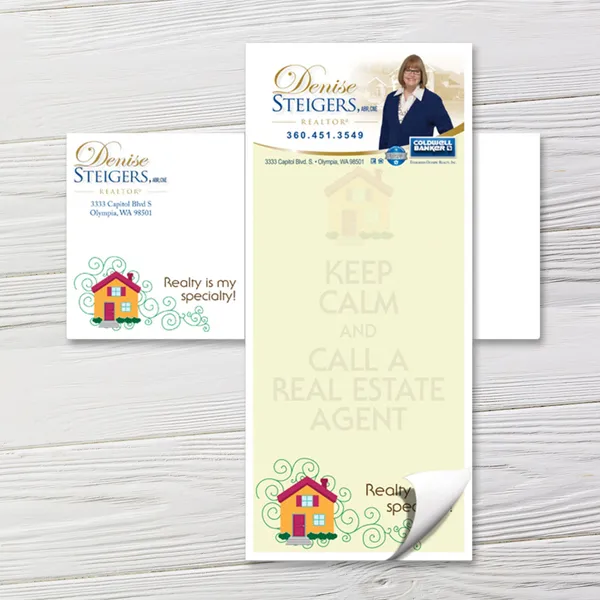 Custom notepad with matching envelopes, cream background, decorative house graphics, professional real estate design