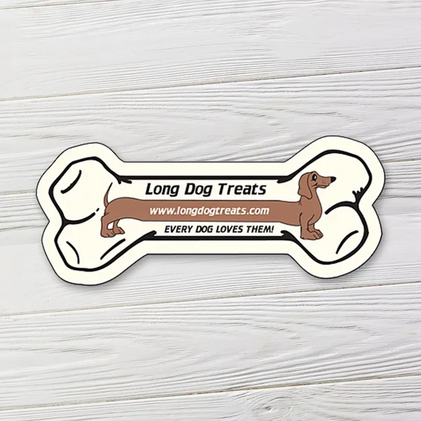 Bone-shaped magnet 3.5x1.5 inches, cream and brown promotional product for custom pet business marketing.