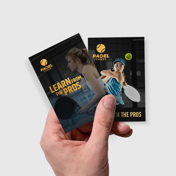 Foil Worx Trading Cards Black foil trading cards held in hand, custom promotional product with gold and blue design