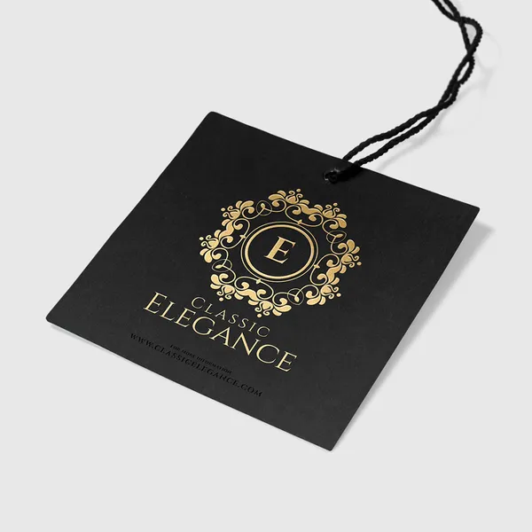 Black hang tag with gold foil ornamental design and twisted string, custom promotional product