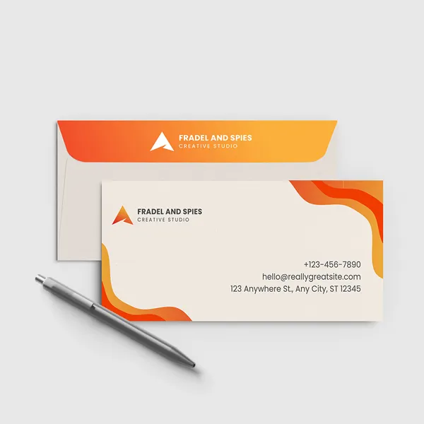 Custom envelopes with orange and cream gradient design, professional business stationery