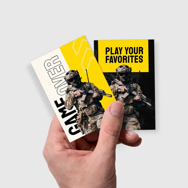 Natural Trading Cards Custom notepad with yellow and black design featuring military figures, held in hand