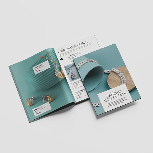 Teal perfect bound catalogs with diamond jewelry showcase, promotional product marketing materials
