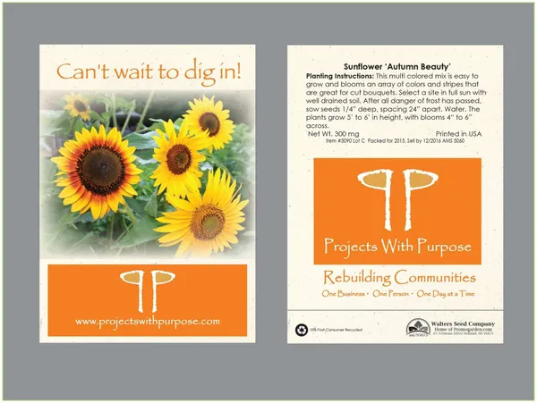 Sunflower Autumn Beauty seed packet promotional product with yellow and orange flowers on cream background