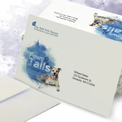 Full Color Variable Data Envelopes Full color custom envelopes with variable data printing, cream with blue watercolor design and dog photo.