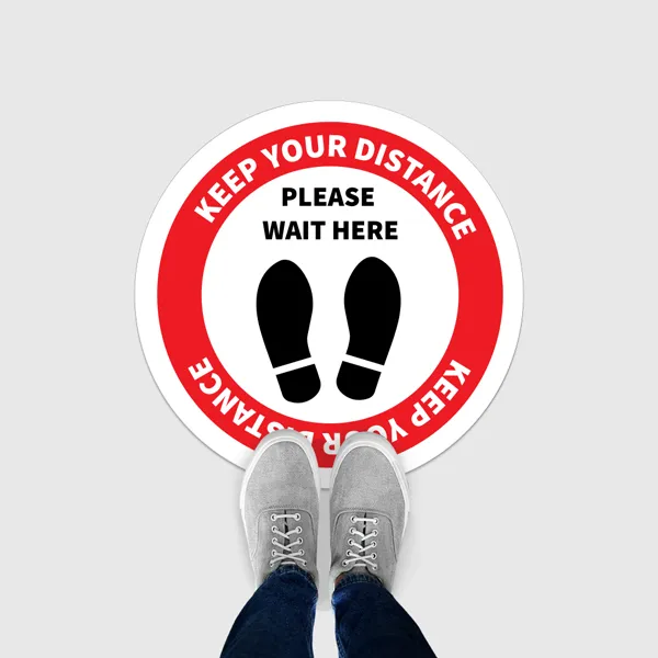 Vinyl Floor Graphics Red and white vinyl floor graphic with footprint design, social distancing promotional decal