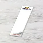 Custom 2 x 6 inch narrow notepad with a Builders Square logo and colored border, top sheet curling, on white wood