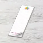 Custom 3 x 8 inch lined list pad with a lotus wellness logo, top sheet curling, on white wood