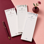 Custom slim Vellum & Vine botanical checklist notepads with a burgundy pen