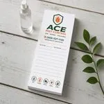 Custom 4 x 8 inch pest control notepad with service date and next treatment lines, beside a spray bottle and leaves