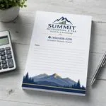 Custom 5.5 x 8.5 inch Summit Accounting & Tax lined notepad with mountains, a calculator and pen