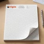 Custom 8.5 x 11 inch small hexagon grid notepad shown flat, printed with a fine honeycomb pattern on a tear-off top-bound pad.