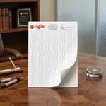 Custom 8.5 x 11 inch small hexagon grid notepad standing upright, with a fine honeycomb pattern on a top-glued pad.