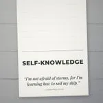 Inspirational Self-Knowledge notepad close-up